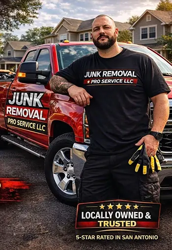 The owner of Junk Removal Pro Service LLC standing in front of the company's red service truck